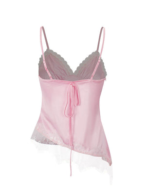 Pink satin camisole with lace trim and asymmetrical hem, tie back detail.