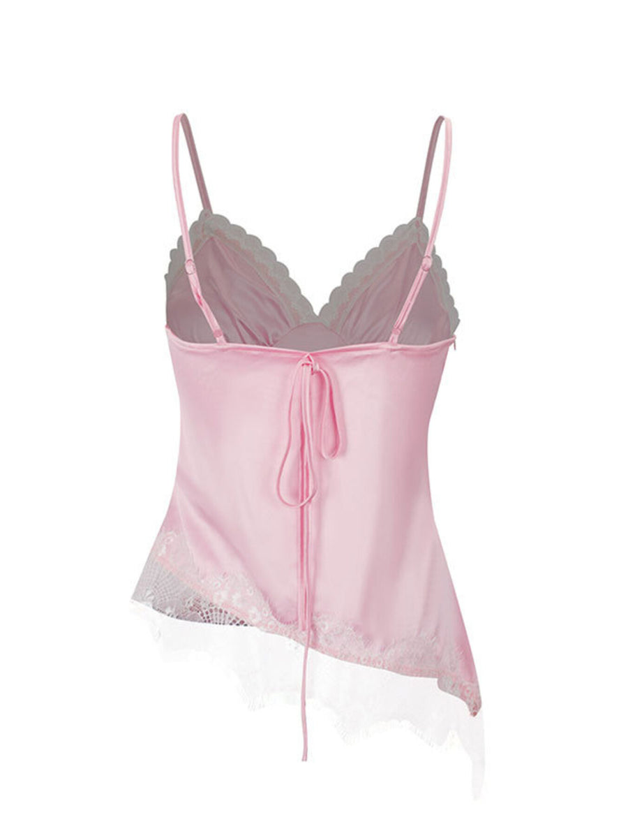 Pink satin camisole with lace trim and asymmetrical hem, tie back detail.