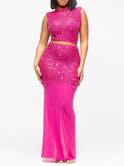two-piece set in fuchsia pink featuring rhinestone and fitted fit