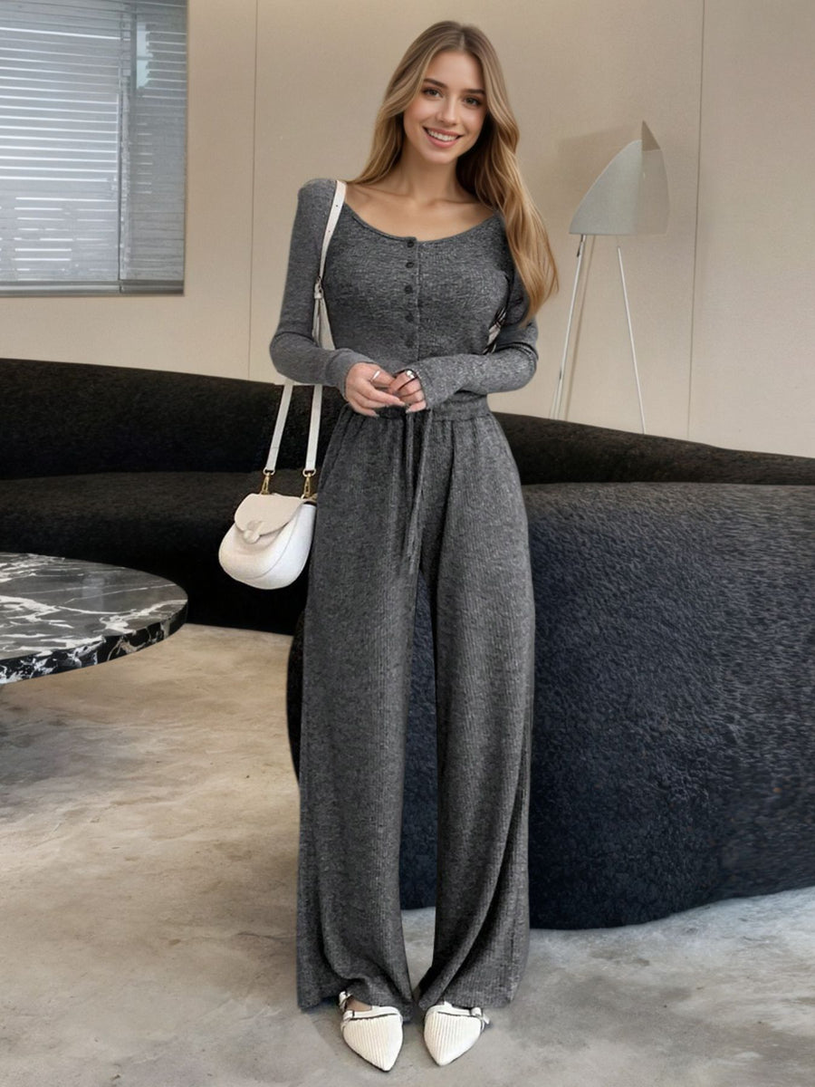 Gray ribbed knit two-piece set with button-down top and wide-leg pants.