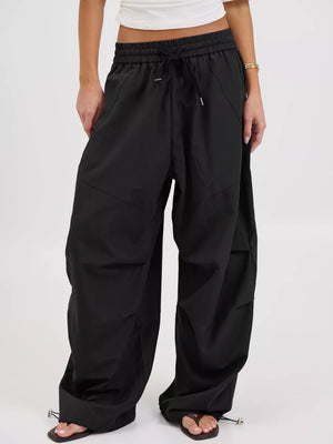 wide-leg pants in Black with drawstring waist and full-length