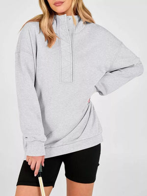 65% polyester, 30% viscose, 5% elastane Care instructions: Machine wash cold pullover hoodie in Black with relaxed silhouette