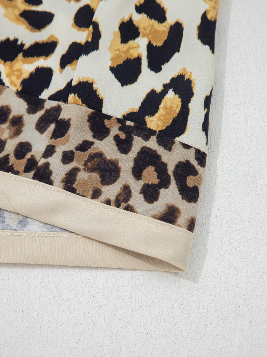Print button-down shirt with leopard print and beige trim detail.