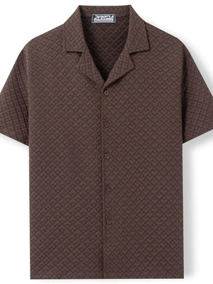 Textured quilted camp collar shirt in coffee brown with all-over geometric pattern.