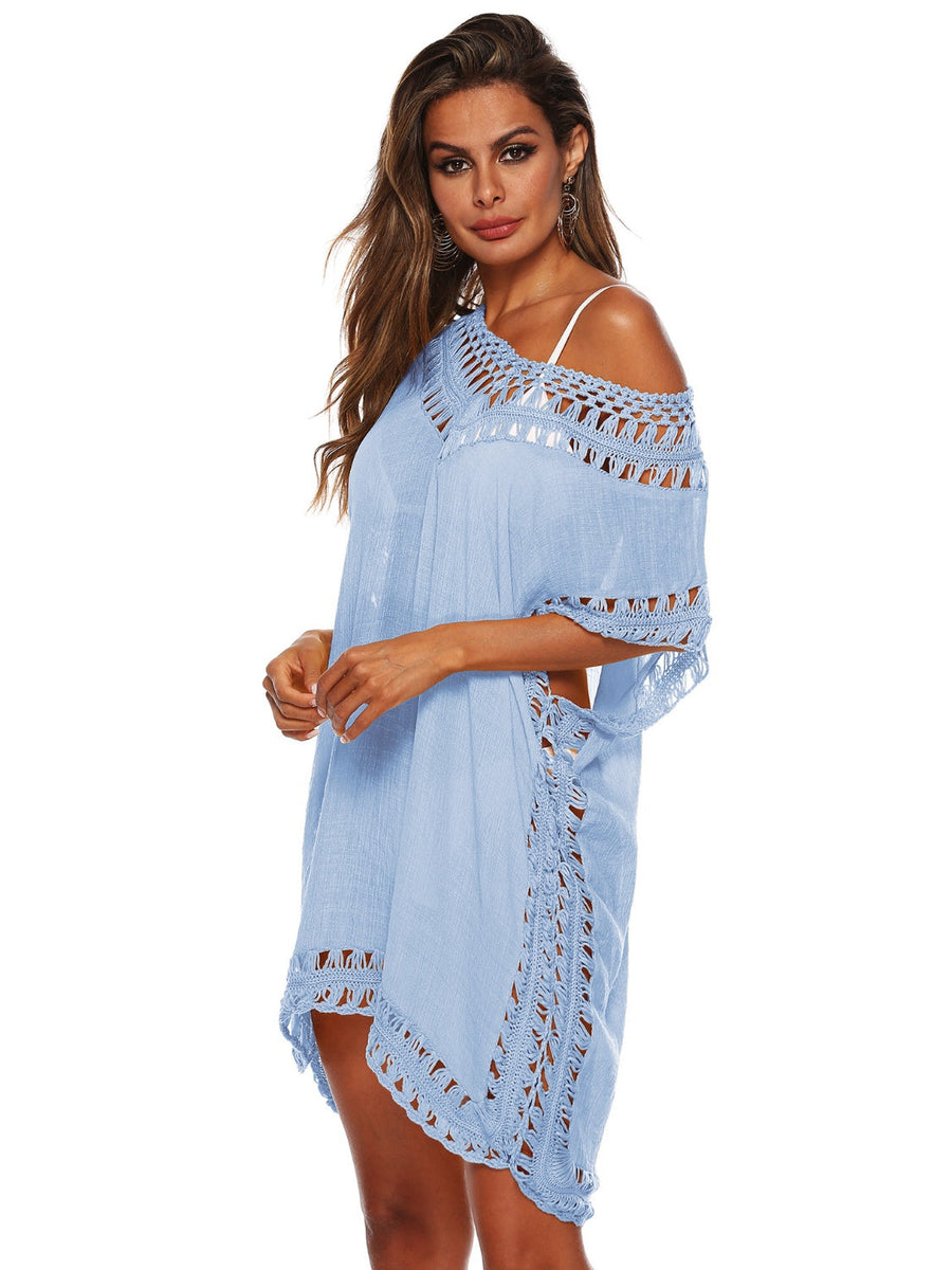 Light blue kaftan cover-up with crochet trim and off-the-shoulder neckline.