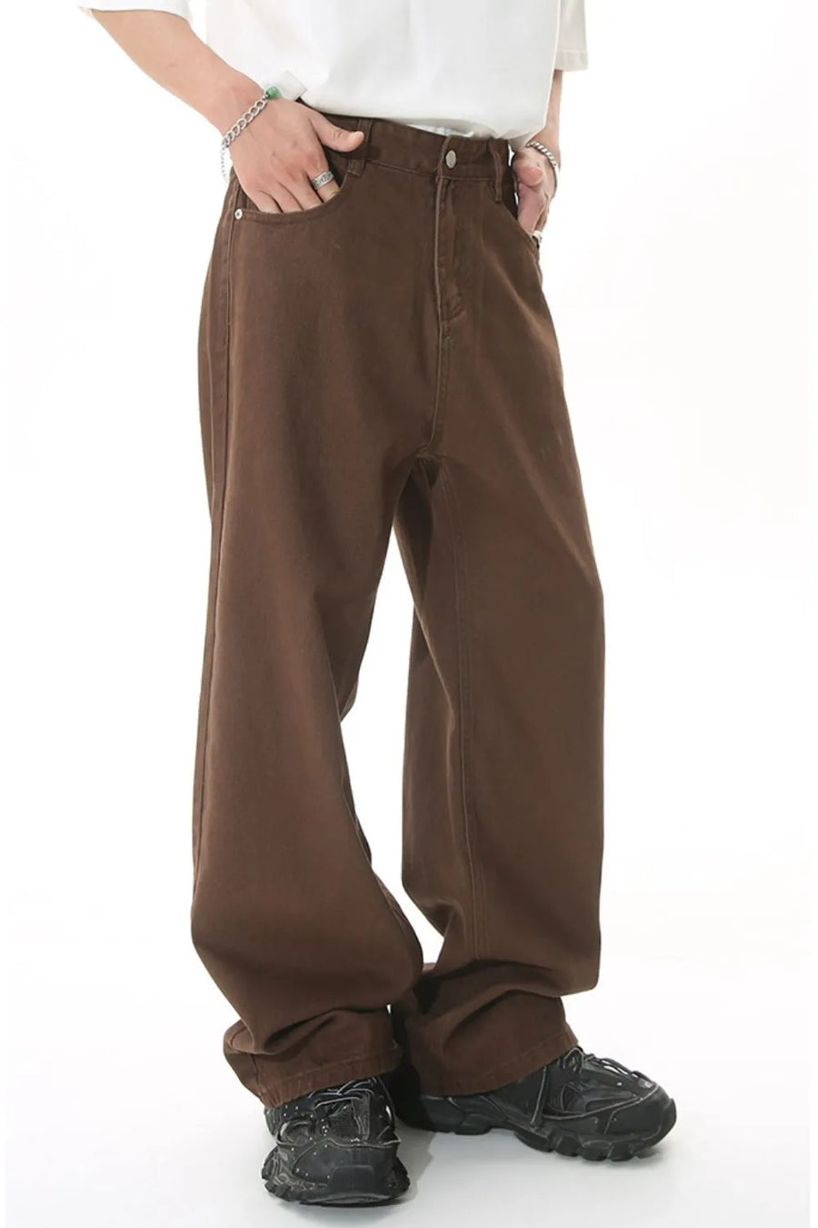 Brown wide-leg denim jeans with a relaxed fit and casual styling.