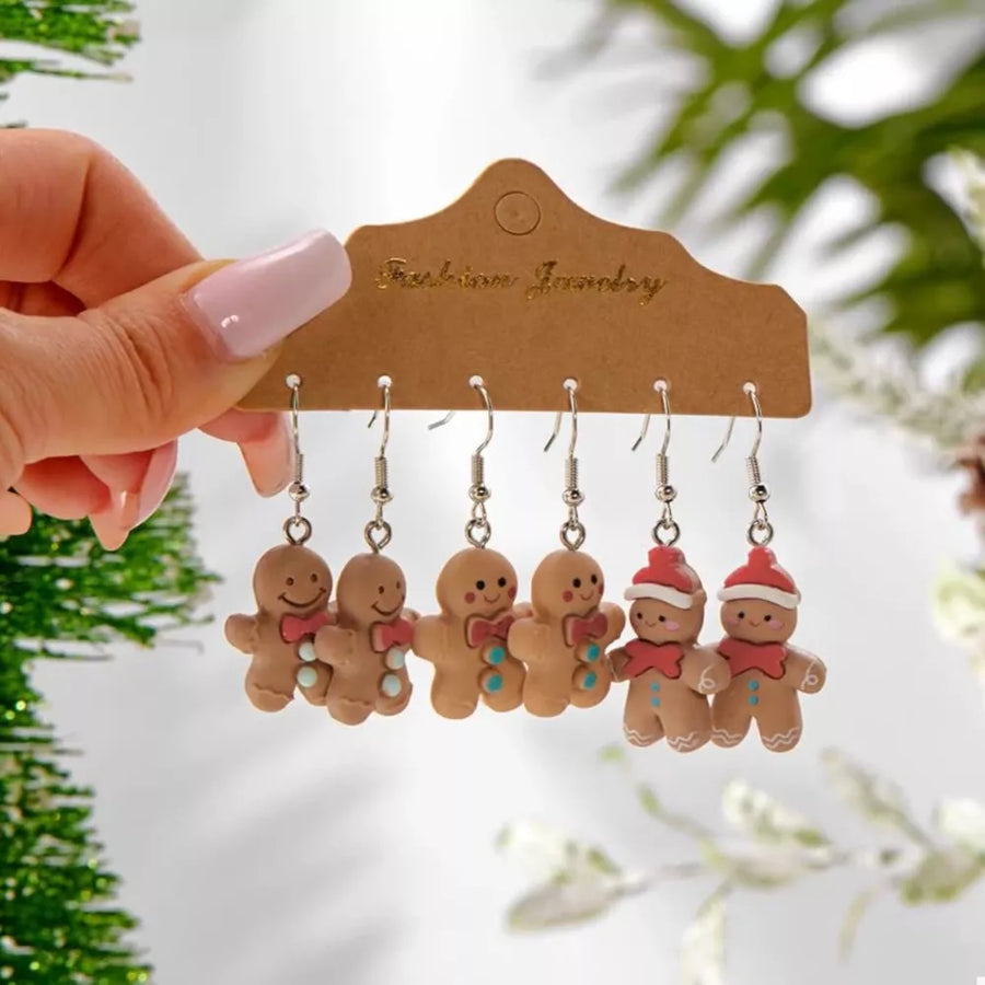 red earrings featuring drop earrings and novelty
