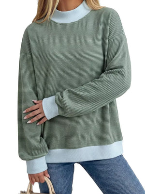 sage green sweatshirt with striped and mock neck