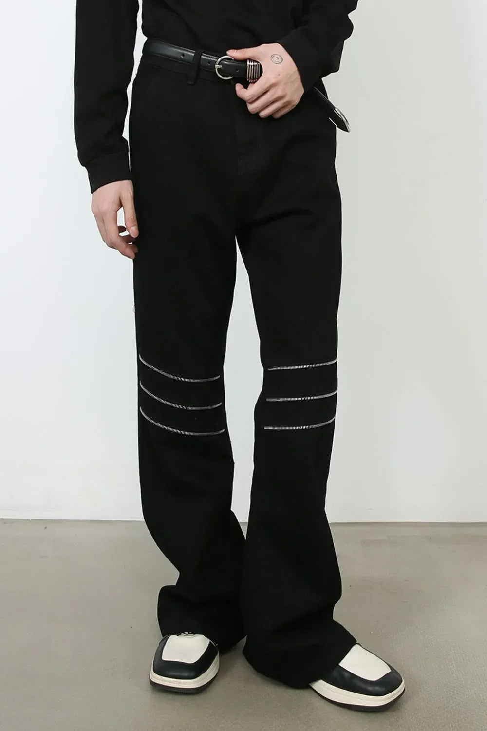 Black bootcut jeans with triple zip knee detail