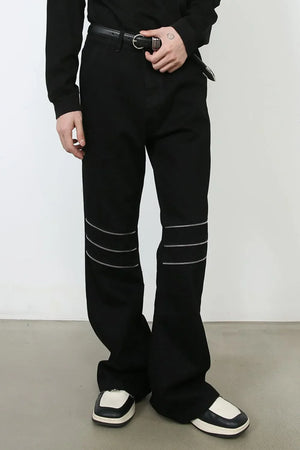 Black bootcut jeans with triple zip knee detail