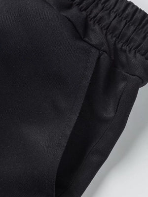 Black cargo shorts with elastic waistband and pocket detail