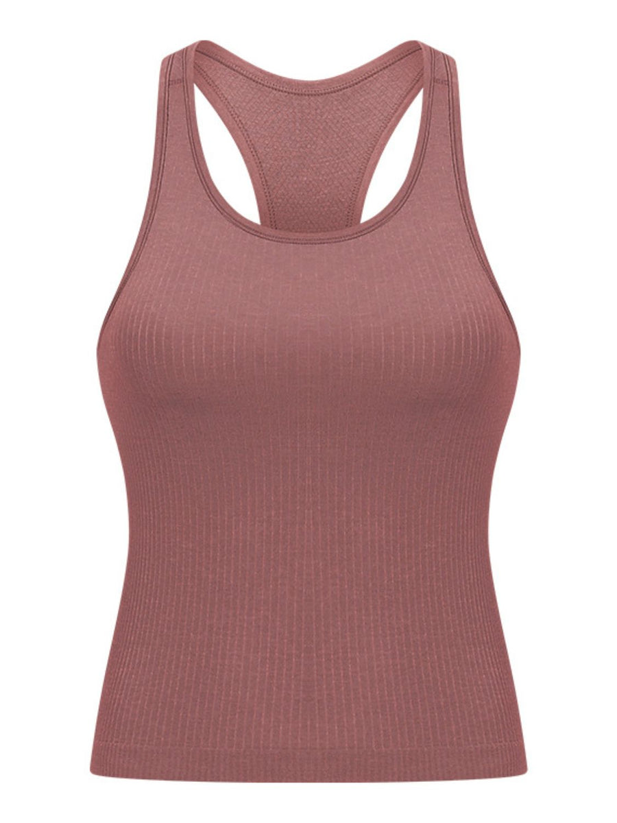 Dusty Pink ribbed racerback tank top with a seamless design and athletic fit.