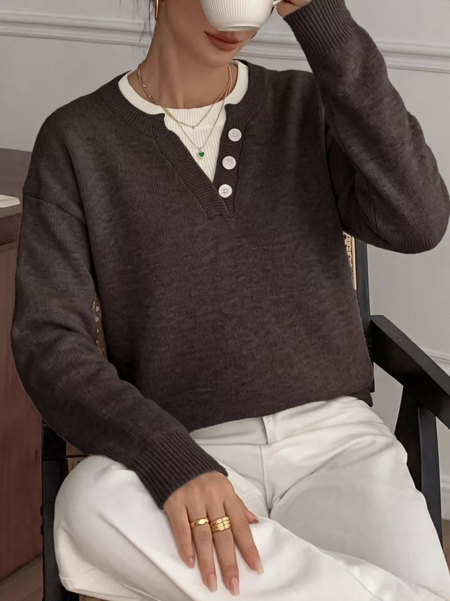 65% acrylic, 35% polyamide Care instructions: Machine wash cold pullover sweater in Black with relaxed silhouette
