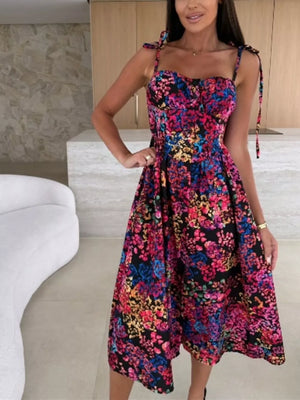 Floral tie-strap midi dress with a sweetheart neckline and A-line skirt.