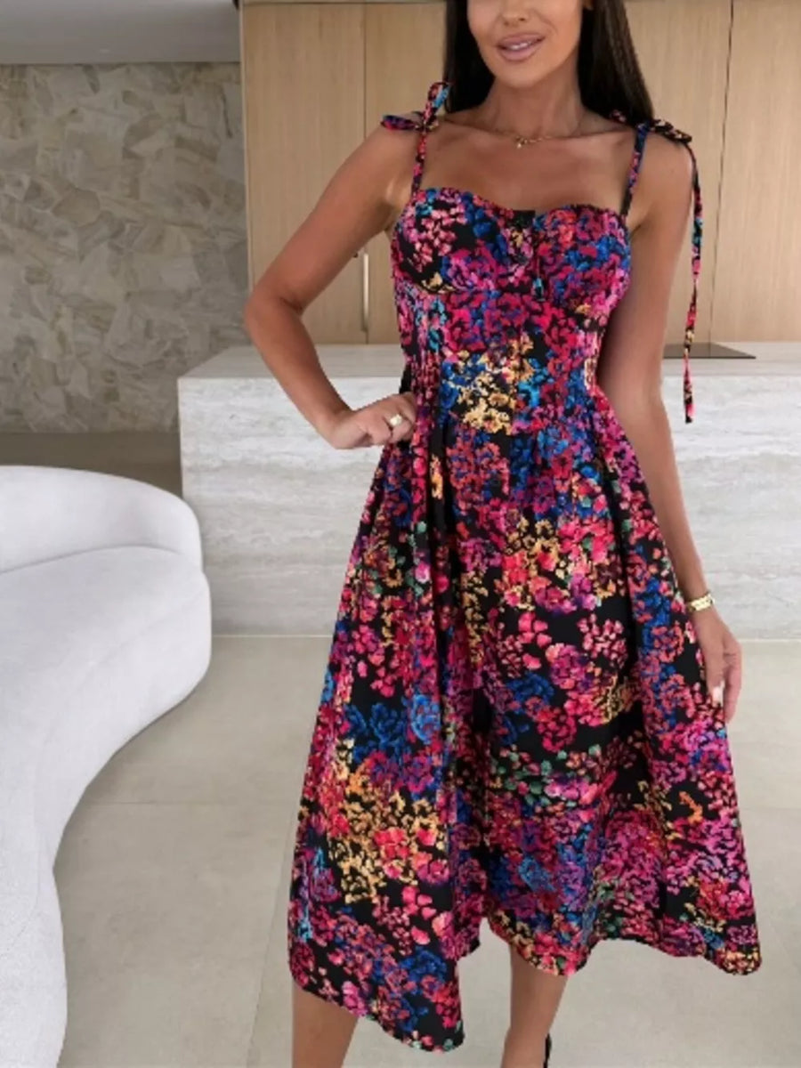 Floral tie-strap midi dress with a sweetheart neckline and A-line skirt.