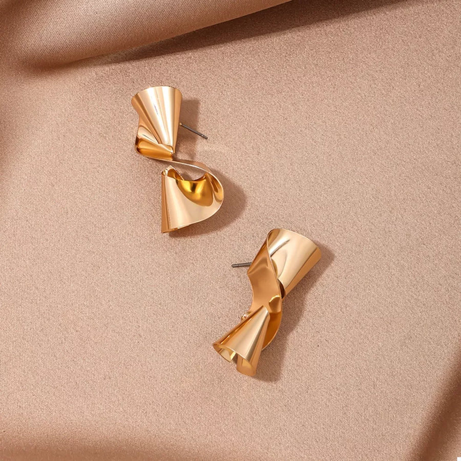 18K Gold-Plated, Alloy Care instructions: Avoid wearing during exercise, as swea earrings in Gold with abstract silhouette