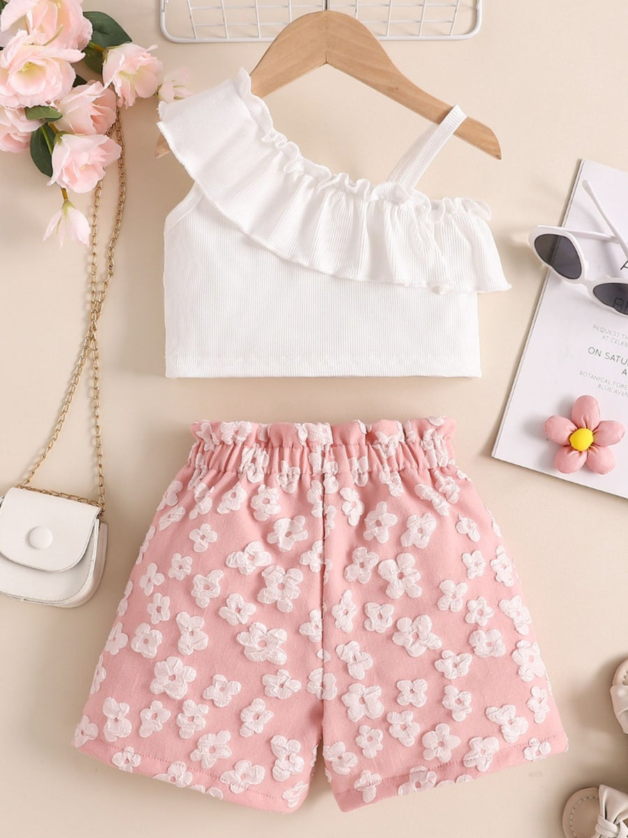 White asymmetrical ruffled top with pink floral textured shorts set