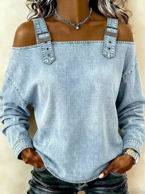 blouse in light blue featuring buckle straps and relaxed fit