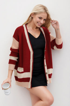 Red striped knit cardigan with cream trim and pockets