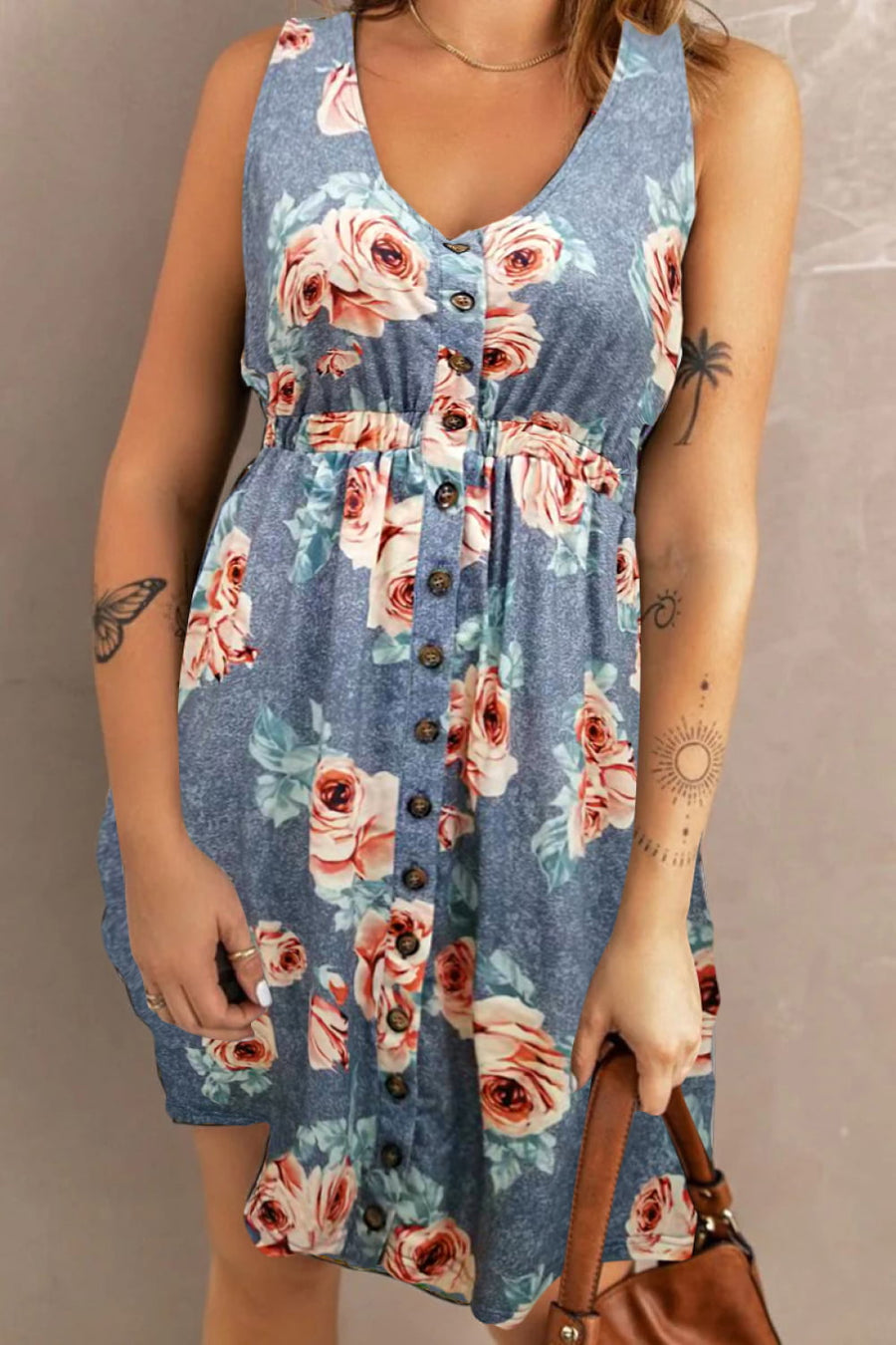 Sleeveless floral midi dress in Misty Blue with button-down front and elastic waist.