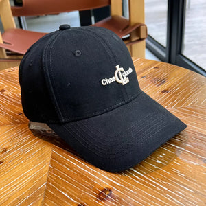 Black baseball cap with embroidered logo detail
