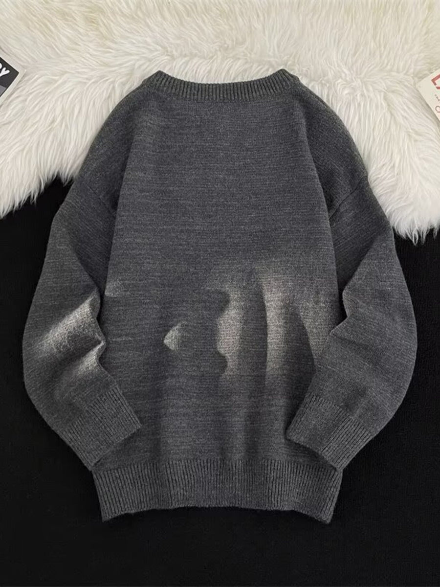 Dark gray crewneck sweater with ribbed cuffs and hem
