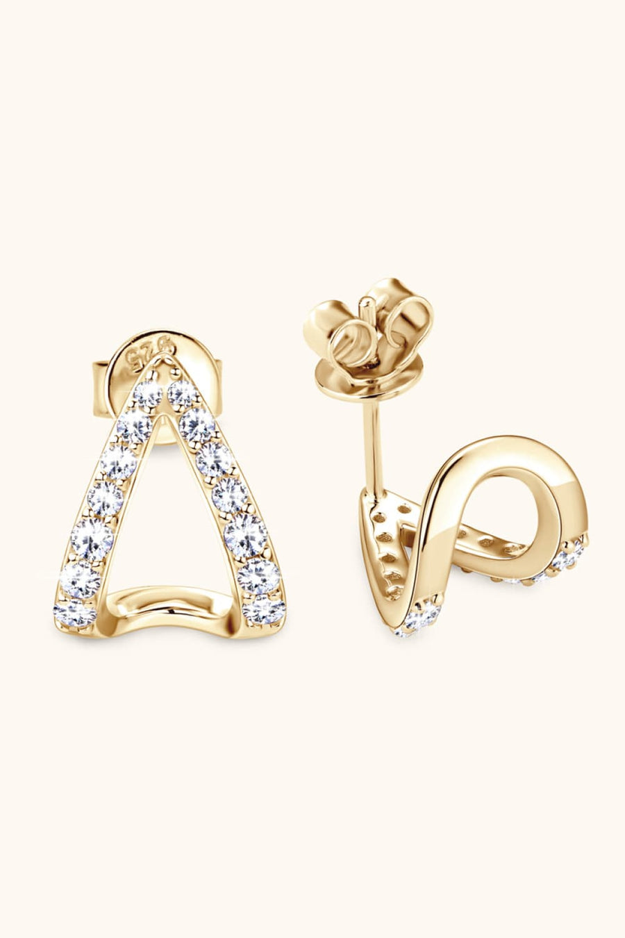 Gold geometric moissanite open-hoop earrings with pavé-set stones.