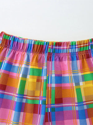 Toddler rainbow plaid cotton blend shorts with elastic waistband.