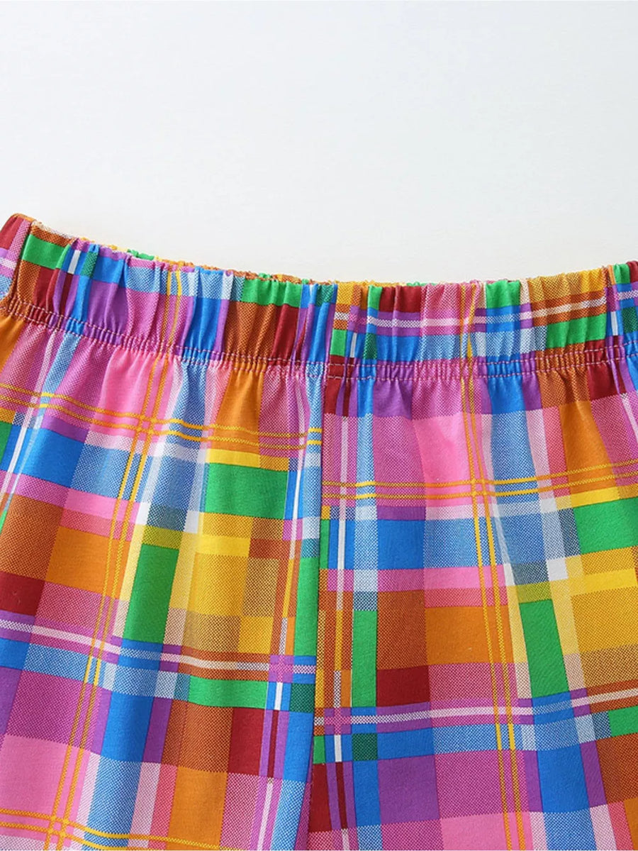 Toddler rainbow plaid cotton blend shorts with elastic waistband.