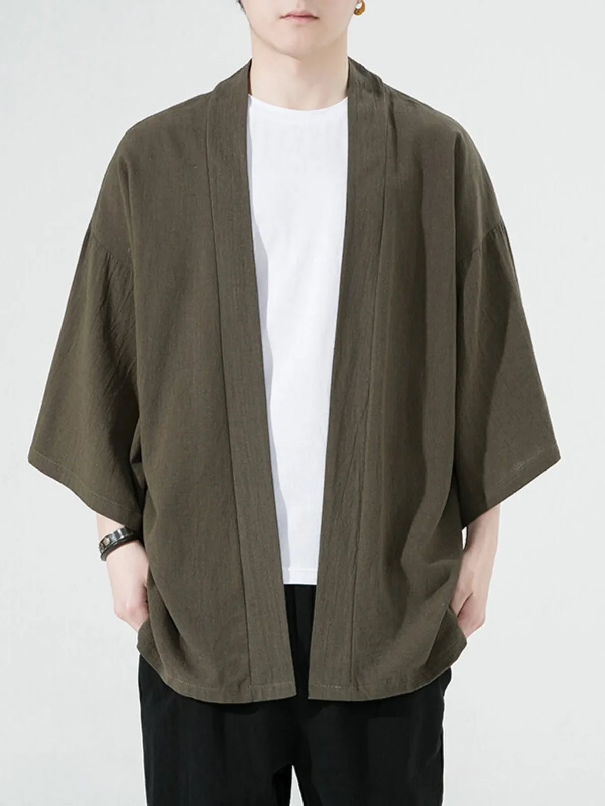 Oversized casual open front jacket in army green with wide sleeves and a relaxed fit.