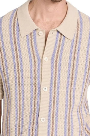 Textured knit polo shirt in tan with vertical blue and brown stripes.