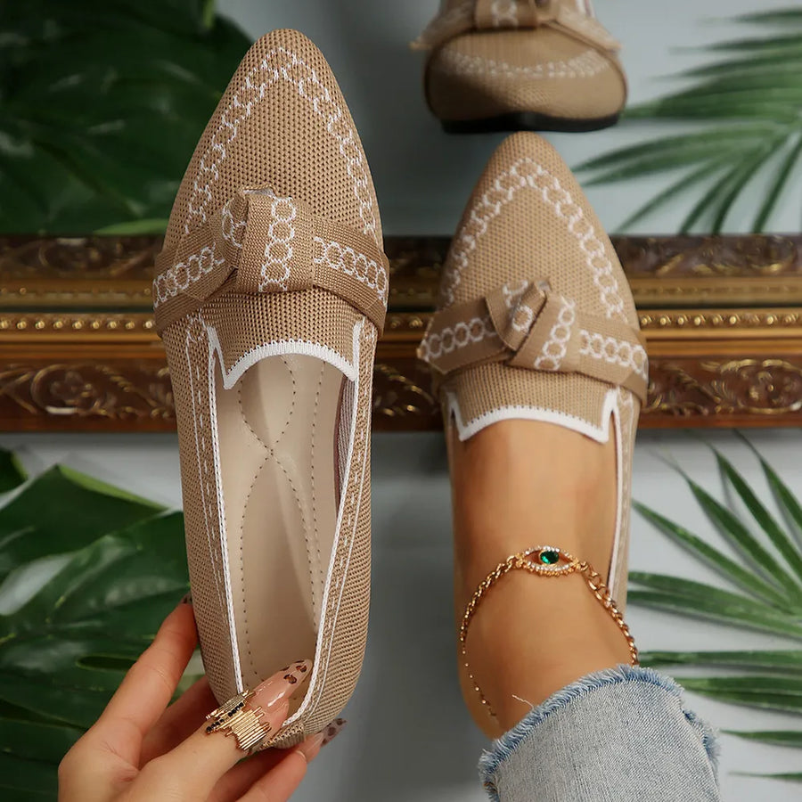 Khaki chain-stitched knit bow pointed flats with white trim and chain detail.