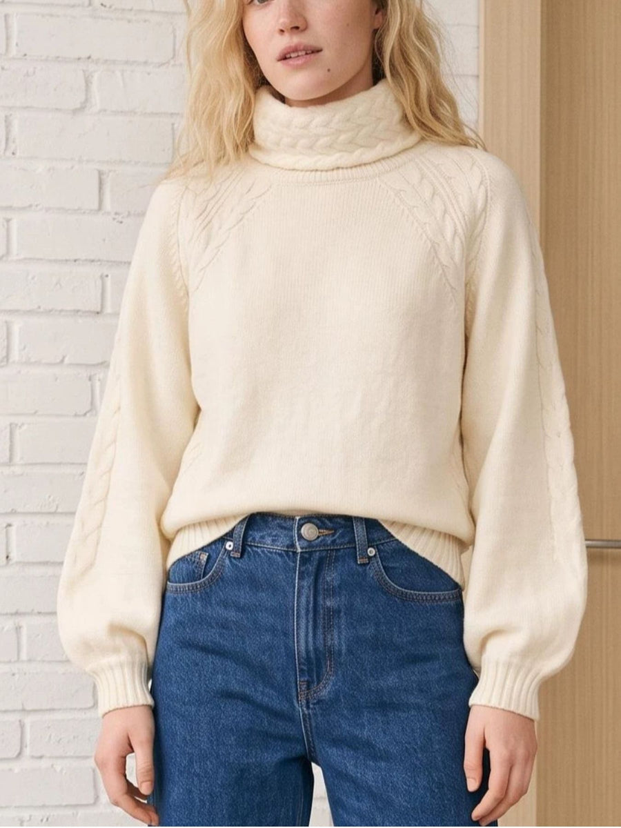 Tangerine turtleneck sweater featuring cable knit and cable knit