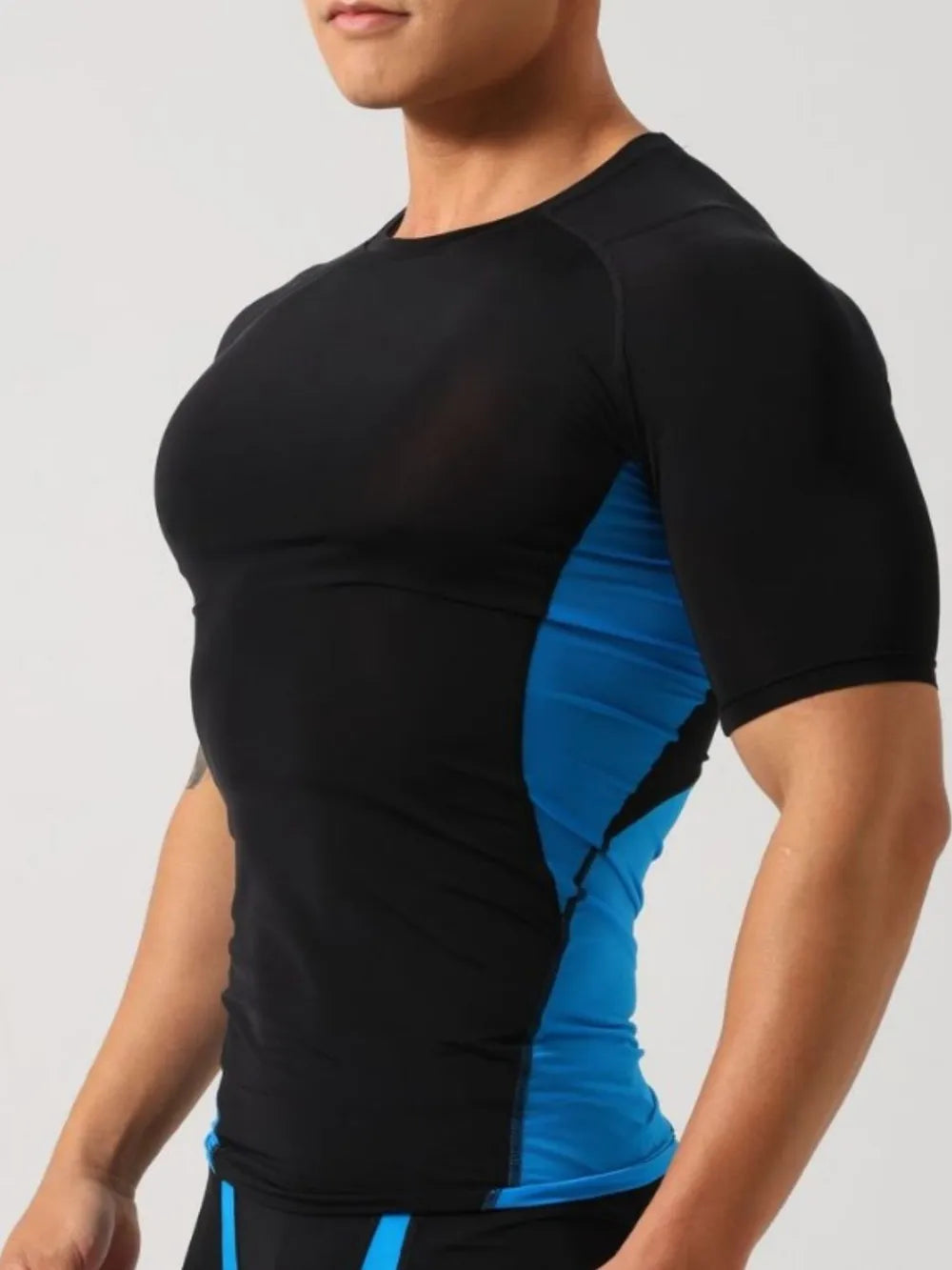 Black performance t-shirt with blue side panels and crew neck