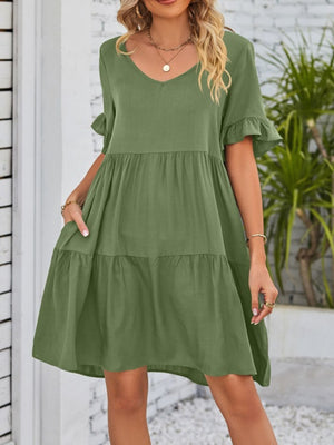Army green ruffled sleeve mini dress with pockets and tiered skirt.