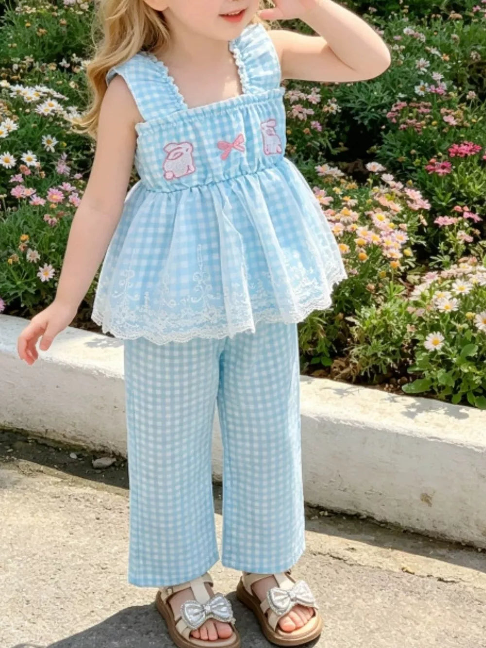 Baby girl's blue gingham cotton set with bunny appliques and lace trim.