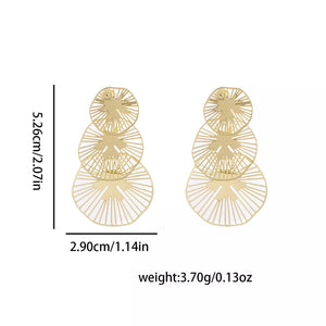 earrings in Gold with geometric and drop earrings