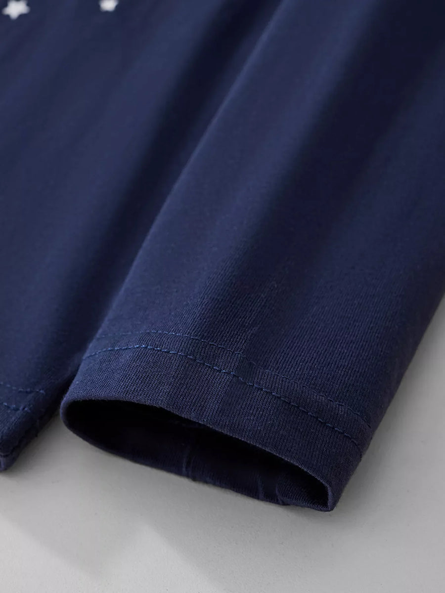 Dark Navy long-sleeve baby tee with white stars and ribbed cuffs.