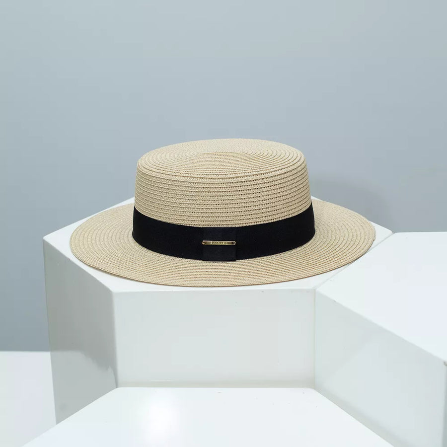 Beige straw boater hat with black band and gold detail