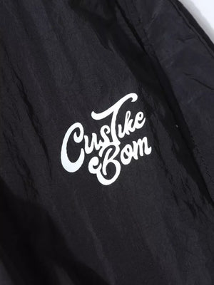 Black wide-leg cargo pants with white script logo detail