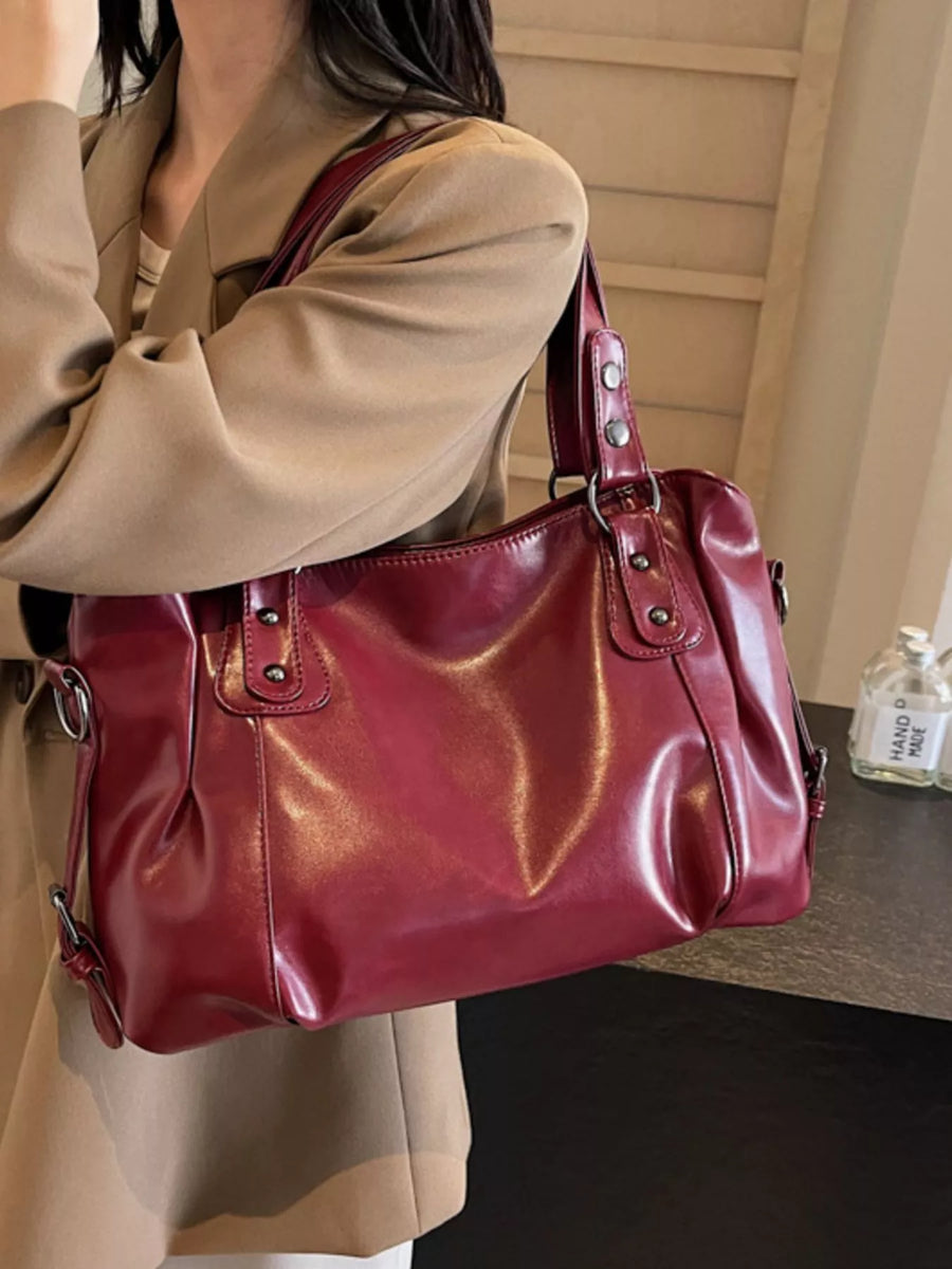 Large vintage PU leather shoulder bag in wine red with silver hardware.