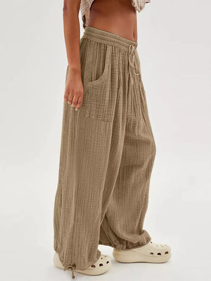 Turquoise wide-leg pants with full-length and drawstring