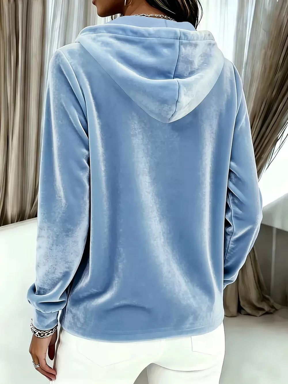 100% polyester Care instructions: Machine wash cold pullover hoodie in White with relaxed silhouette