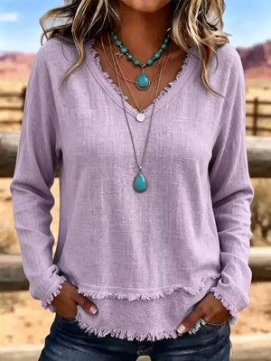 blouse in Black with raw hem and hip-length