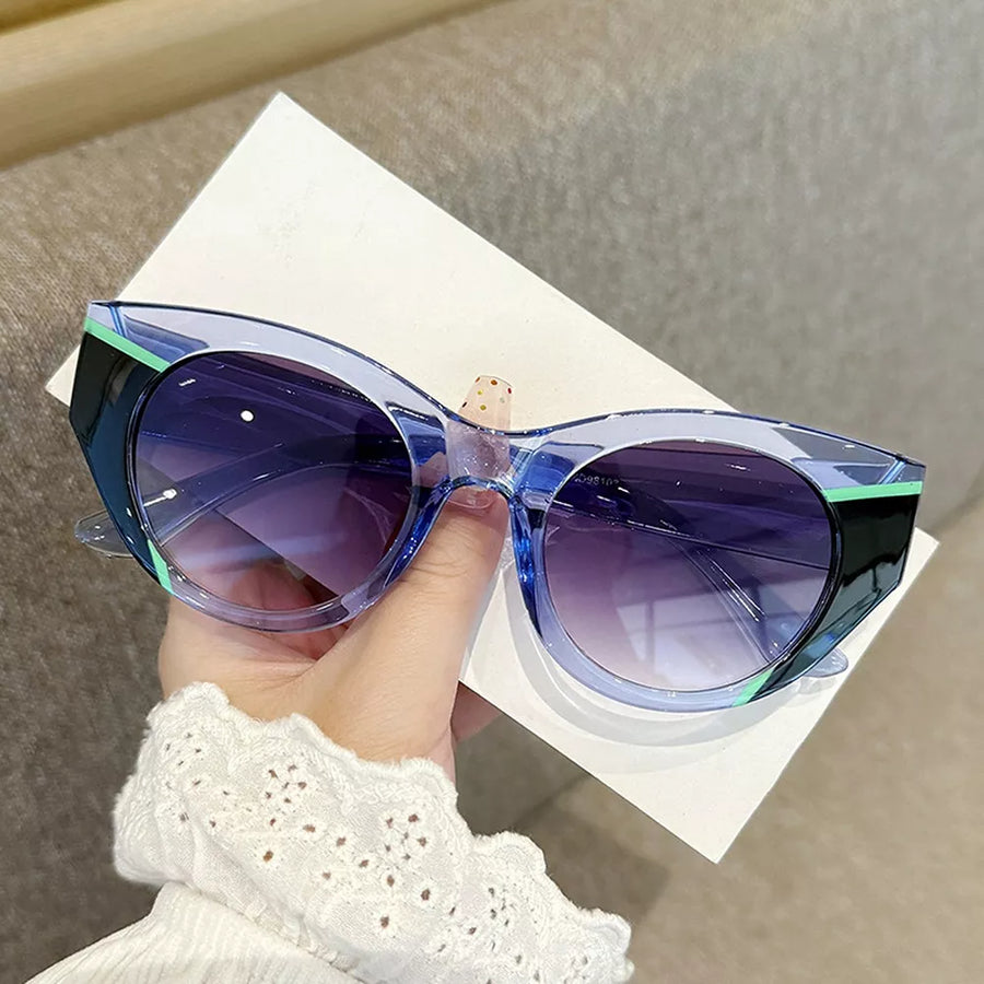 PC Frame material: Polycarbonate Lens material: Polycarbonate Temple material: P sunglasses in tan with cat-eye silhouette