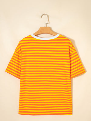 Striped round-neck t-shirt in tangerine and yellow cotton with short sleeves.