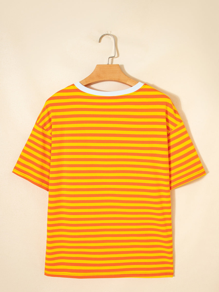 Striped round-neck t-shirt in tangerine and yellow cotton with short sleeves.