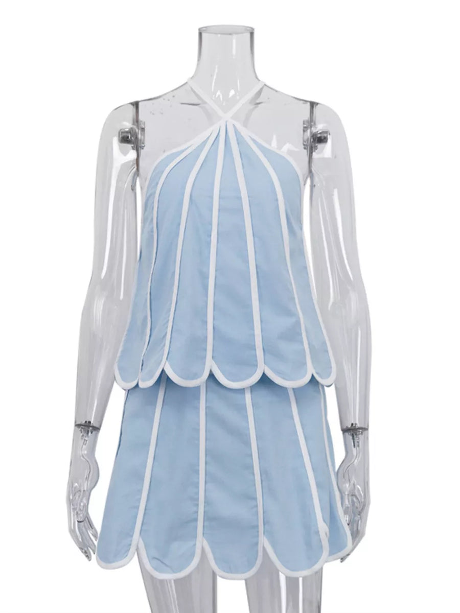 Blue halter top and skirt set with white trim and scalloped hem