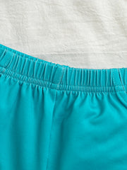 Children's turquoise shorts with elastic waistband detail
