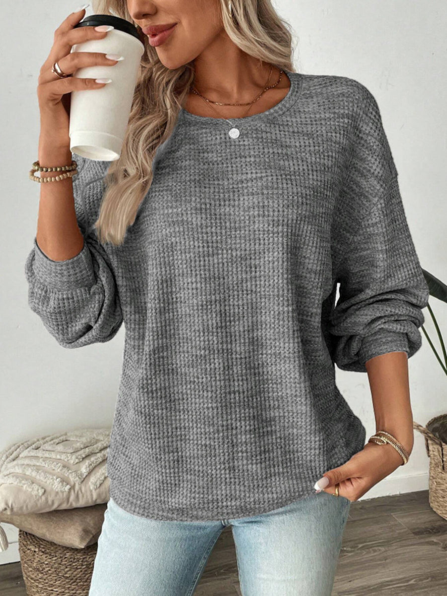 light blue relaxed pullover sweater with crew neck